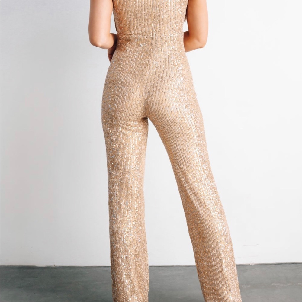 Gold sequin jumpsuit from Baltic born.